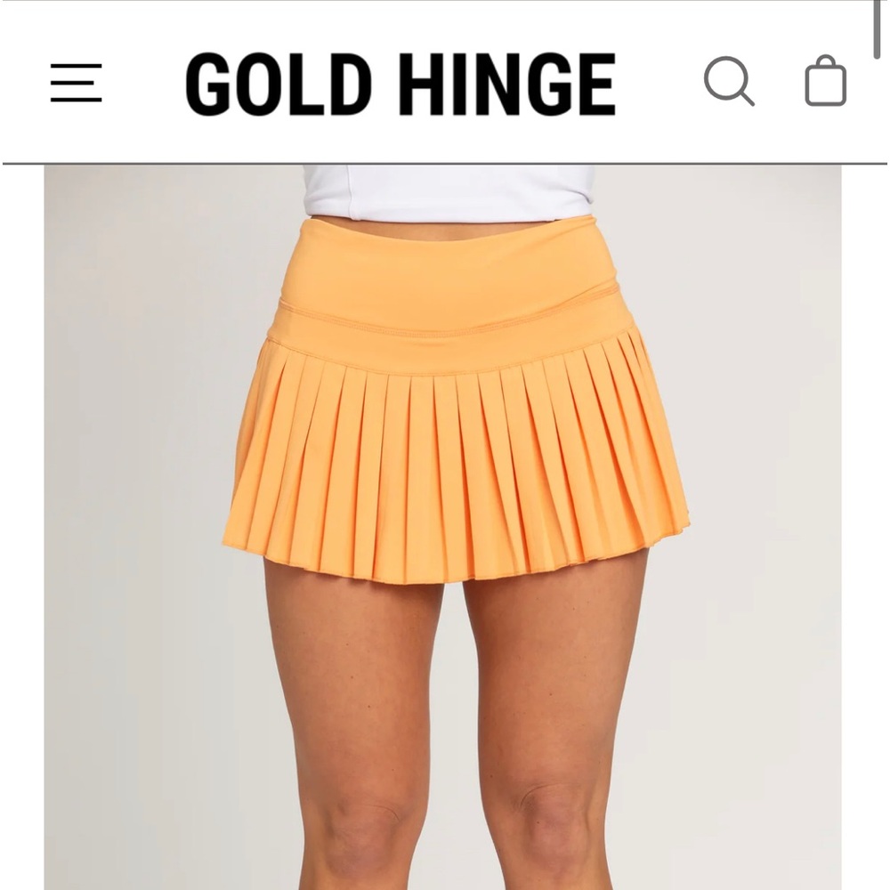 Orange gold hinge skirt sizes S and M🧡